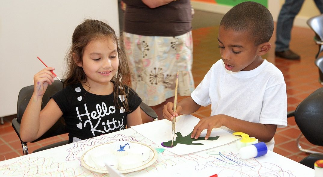 two children painting