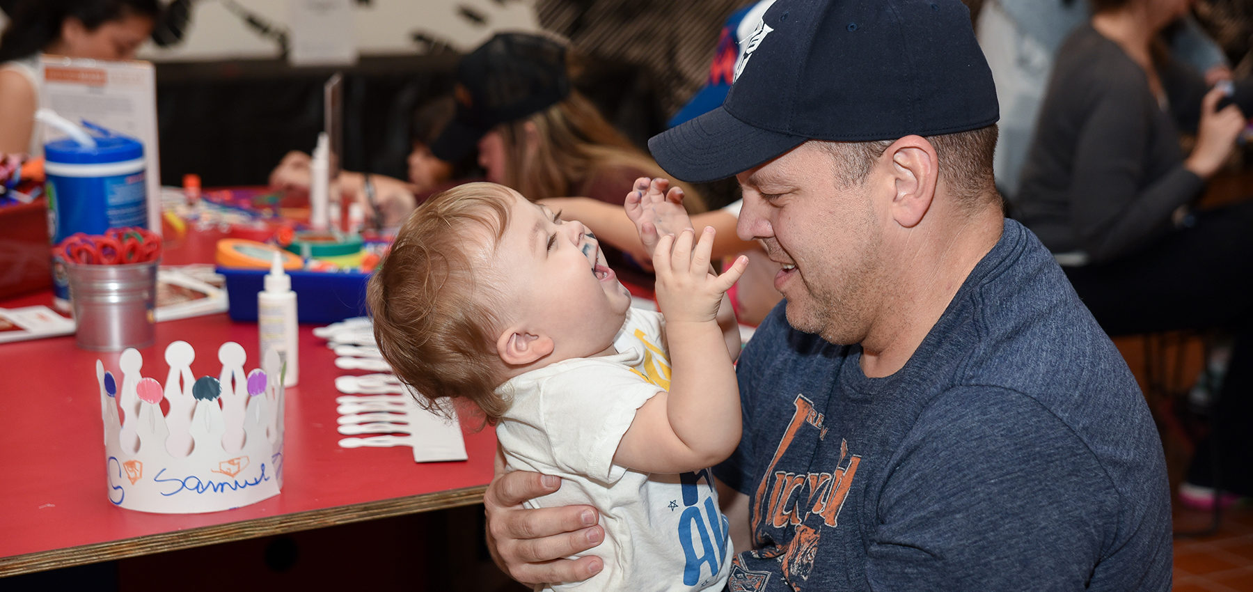 Boy and father playing
