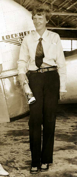 Amelia Earhart at Opa-locka Airport a day or two before she began her around-the-world flight. 1937. Karl Voelter papers, HistoryMiami, 1985-189-1.