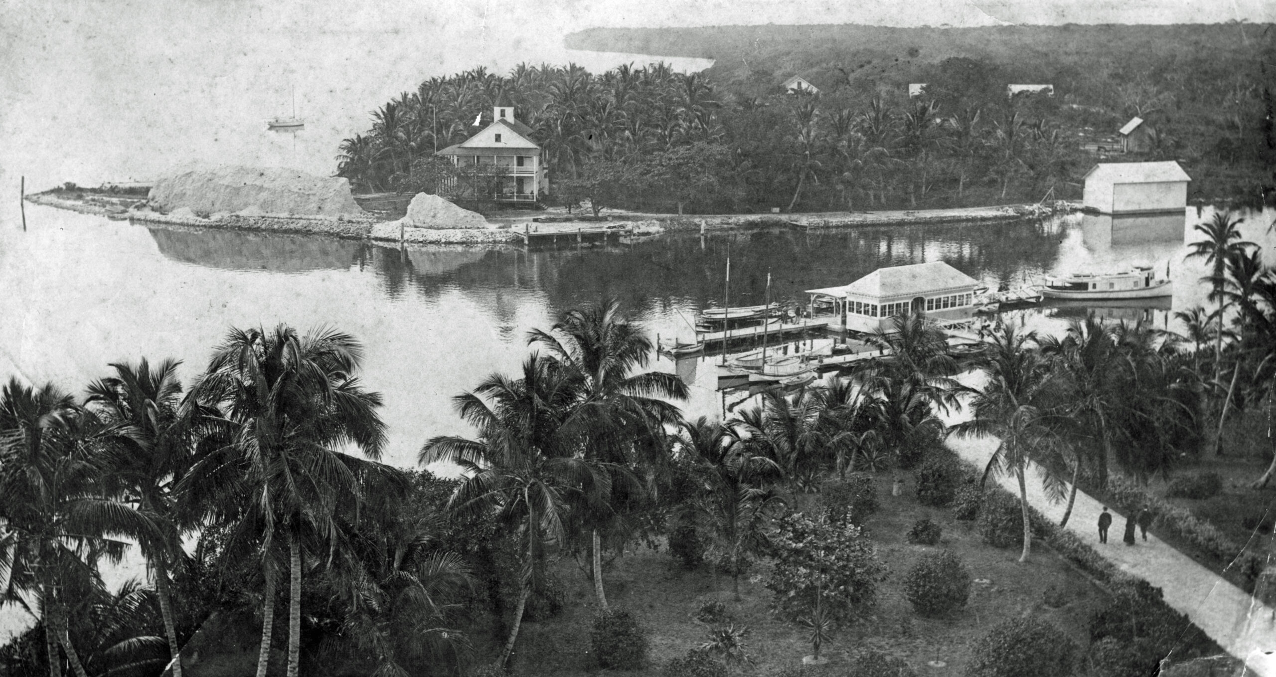 View looking south at the mouth of the Miami River. The Brickell family home is in view on the south bank.