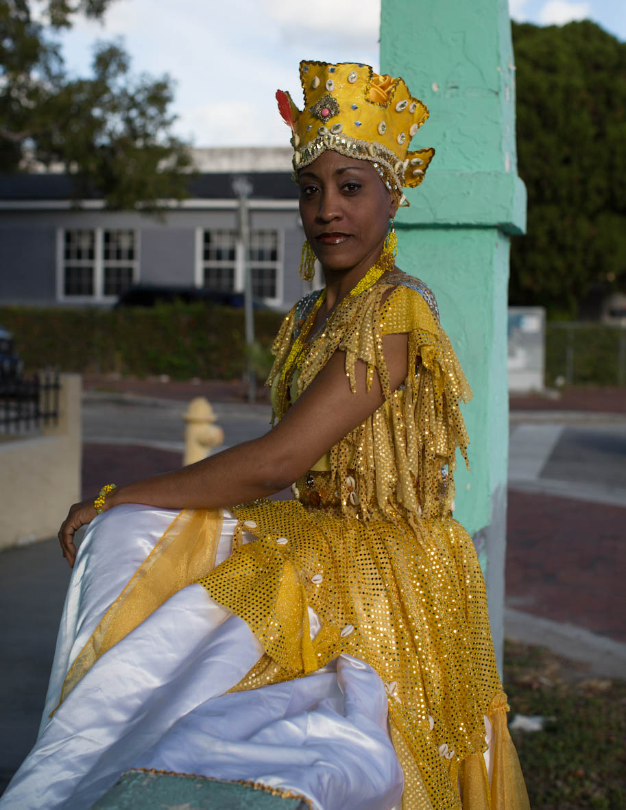 Marisol Blanco wears a yellow dress and crown in the dance costume for the Orisha deity Oshun