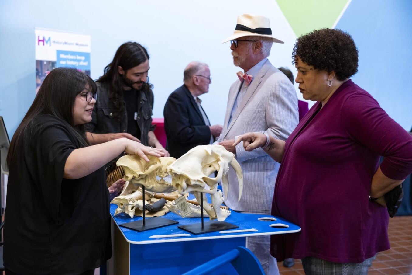 Members interacting with museum educator
