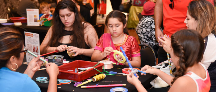 group sitting doing crafts