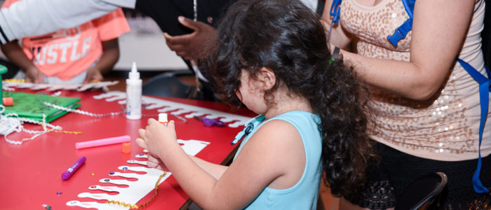 white girl doing a craft