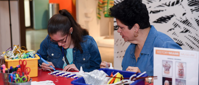 white middle age woman and white woman coloring