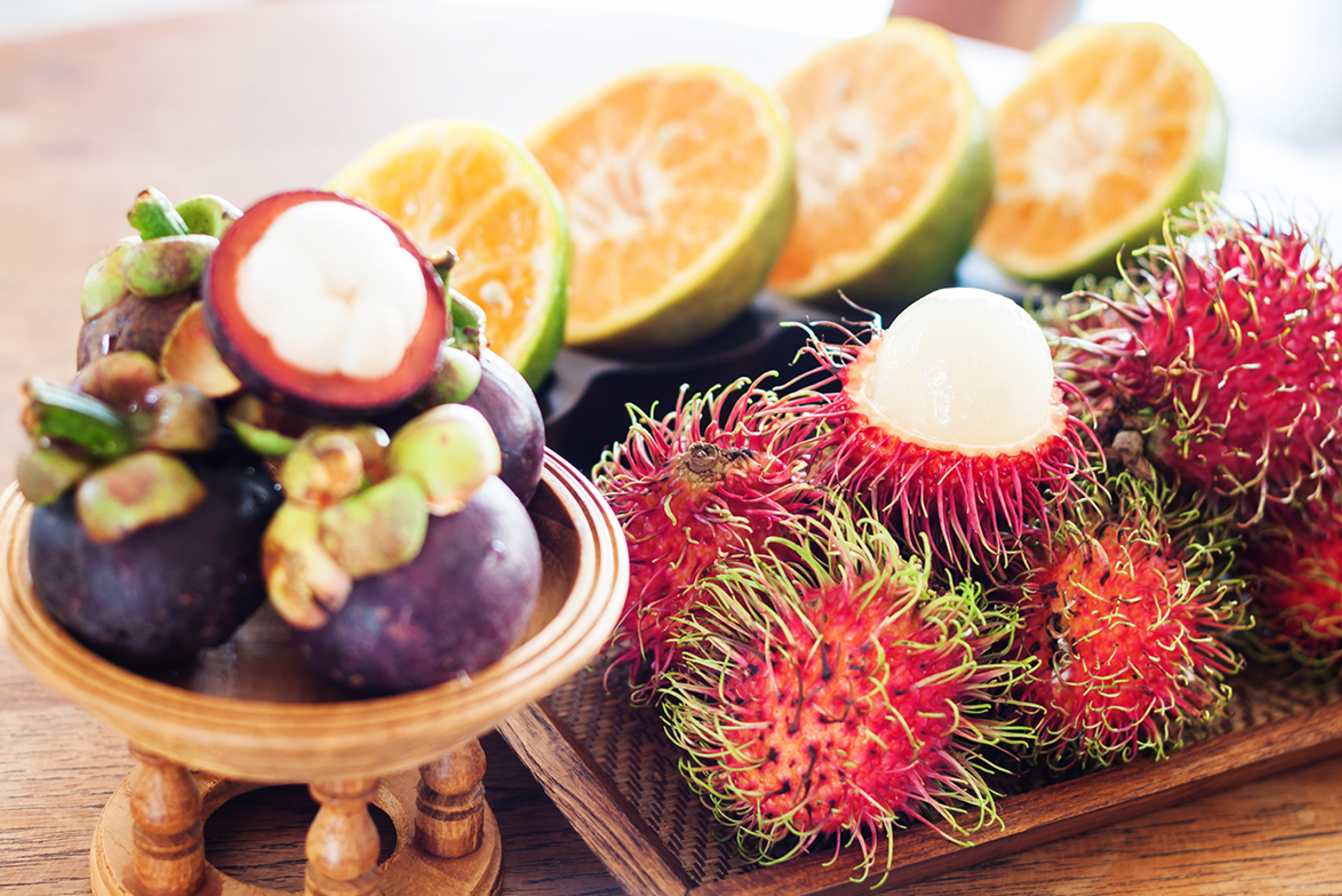tropical fruit on wooden table, stock photo