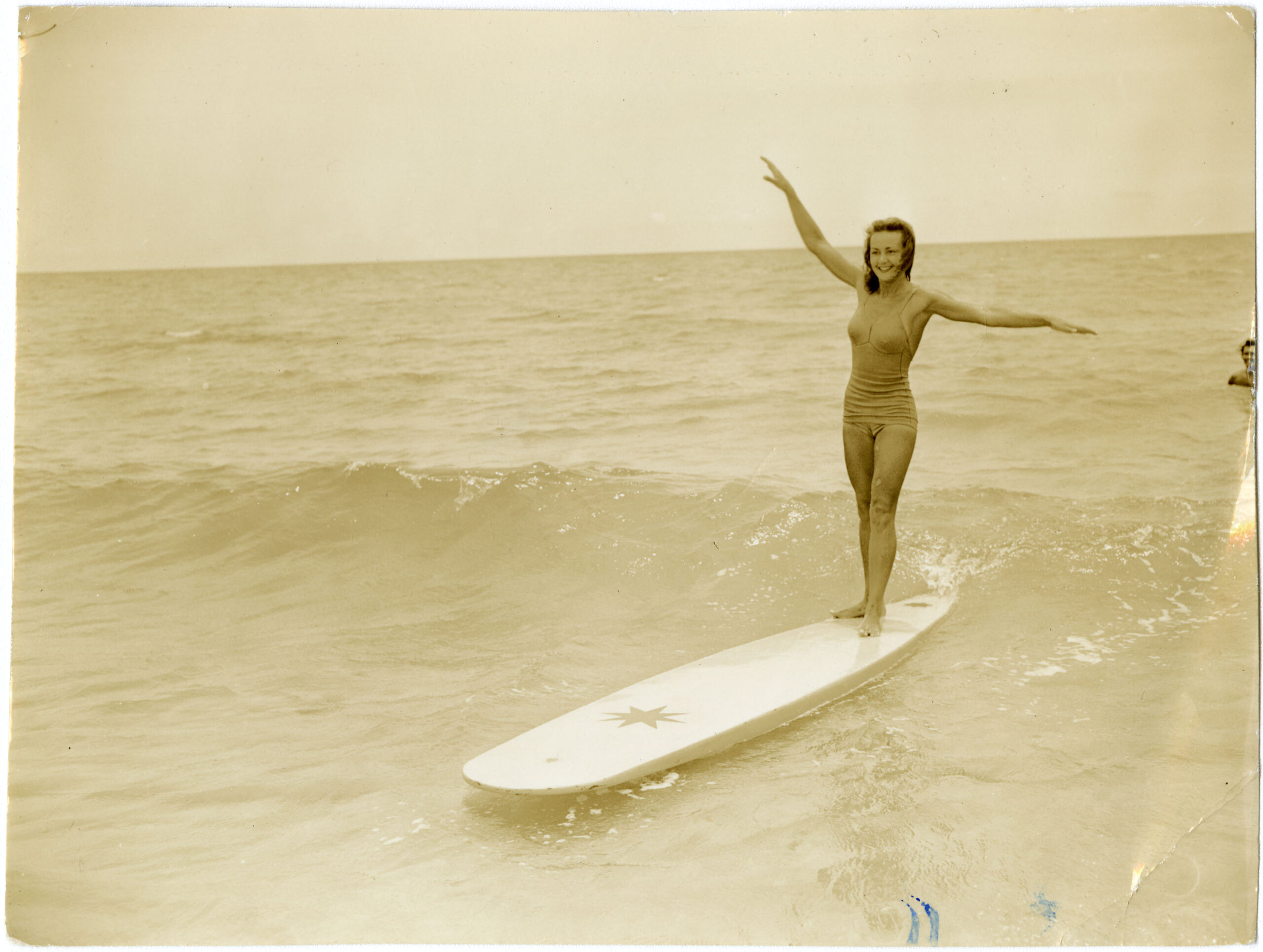 woman on surfboard in ocean